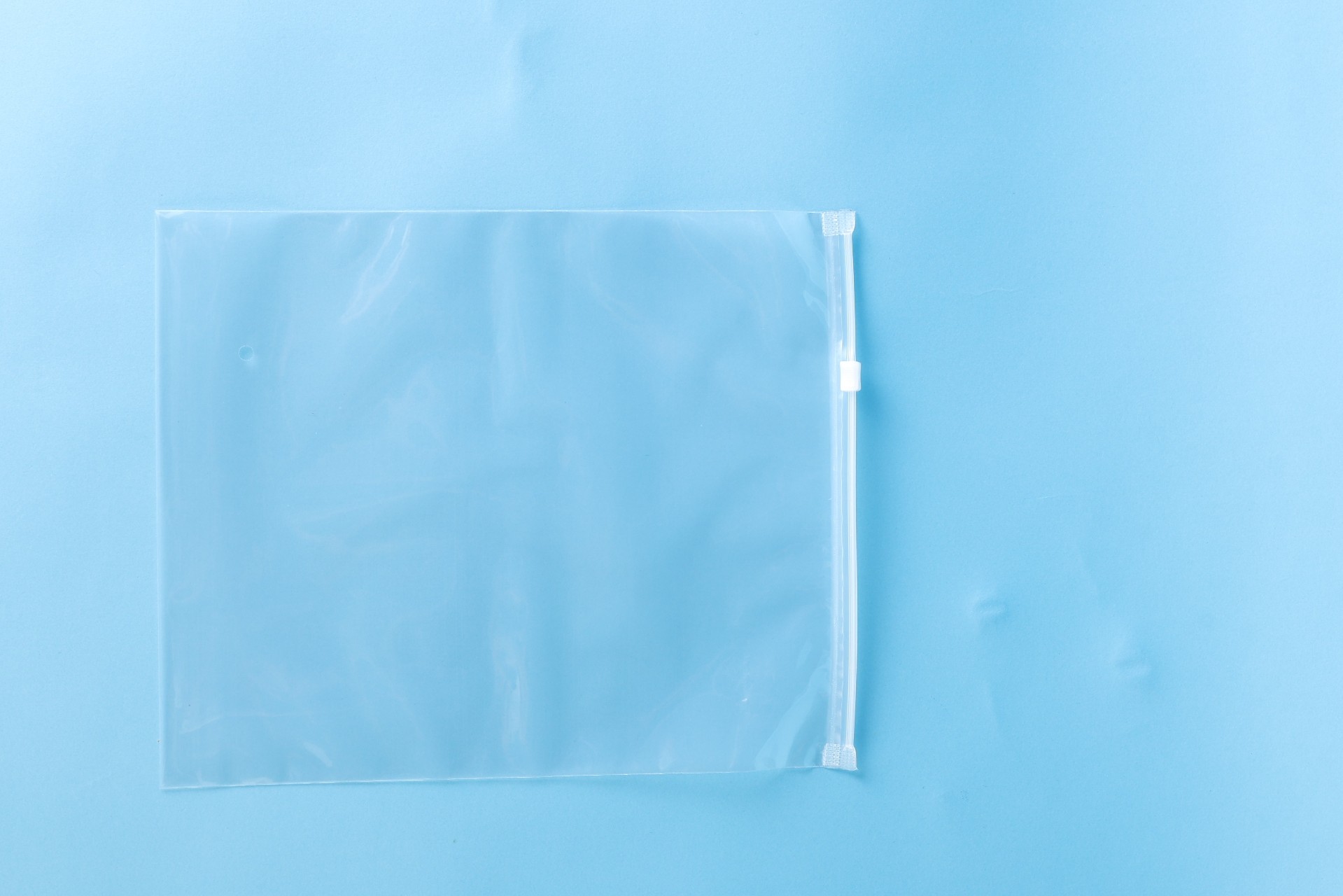 Transparent slider zipper bag in a standard garment packing size