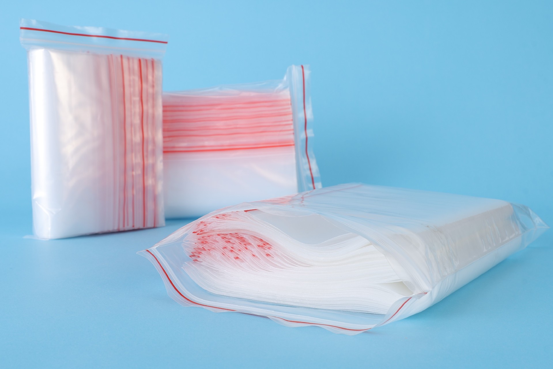 Stacks of clear PE ziplock bags ready for electronics component packing